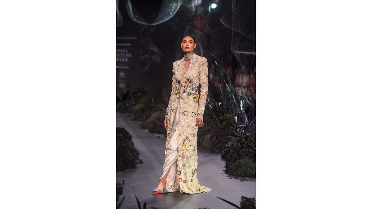 Actor Athiya Shetty turned showstopper for designer Anamika Khanna during the India Couture Week 2023, in New Delhi. Credit: PTI Photo