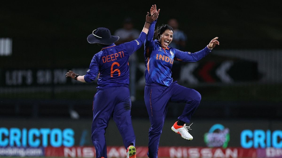 India's Sneh Rana (R) and Deepti Sharma celebrate the victory during the 2022 Women's Cricket World Cup match between West Indies and India at Seddon Park in Hamilton. Credit: AFP file Photo