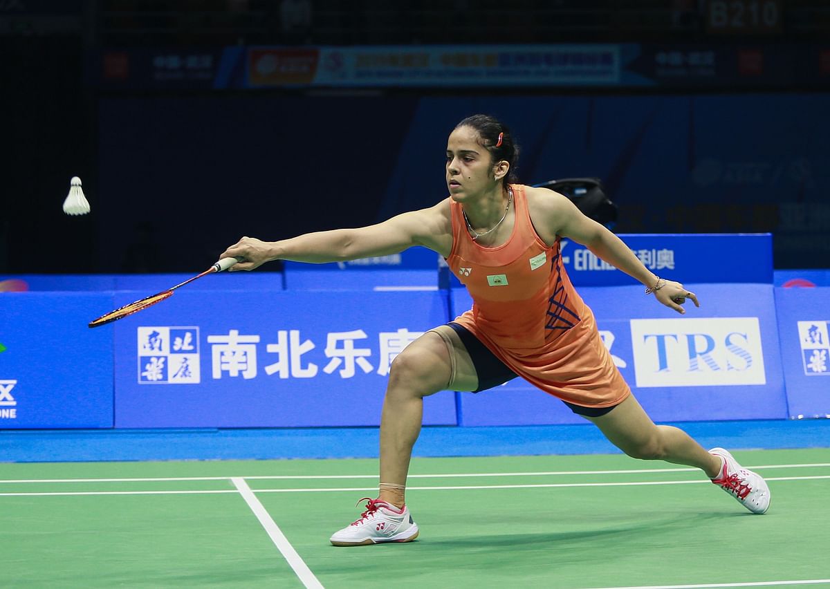 Badminton players like Saina Nehwal (London Olympics bronze medallist) and Kidami Srikanth (a former World No. 1), yet to secure their ticket to Tokyo, the Olympic hopes remain a doubt as they can’t exit the country as many are refusing to grant visas to Indians because of the deadly strain here. Credit: AFP