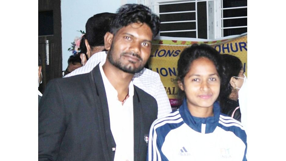Anita with her coach, Anand