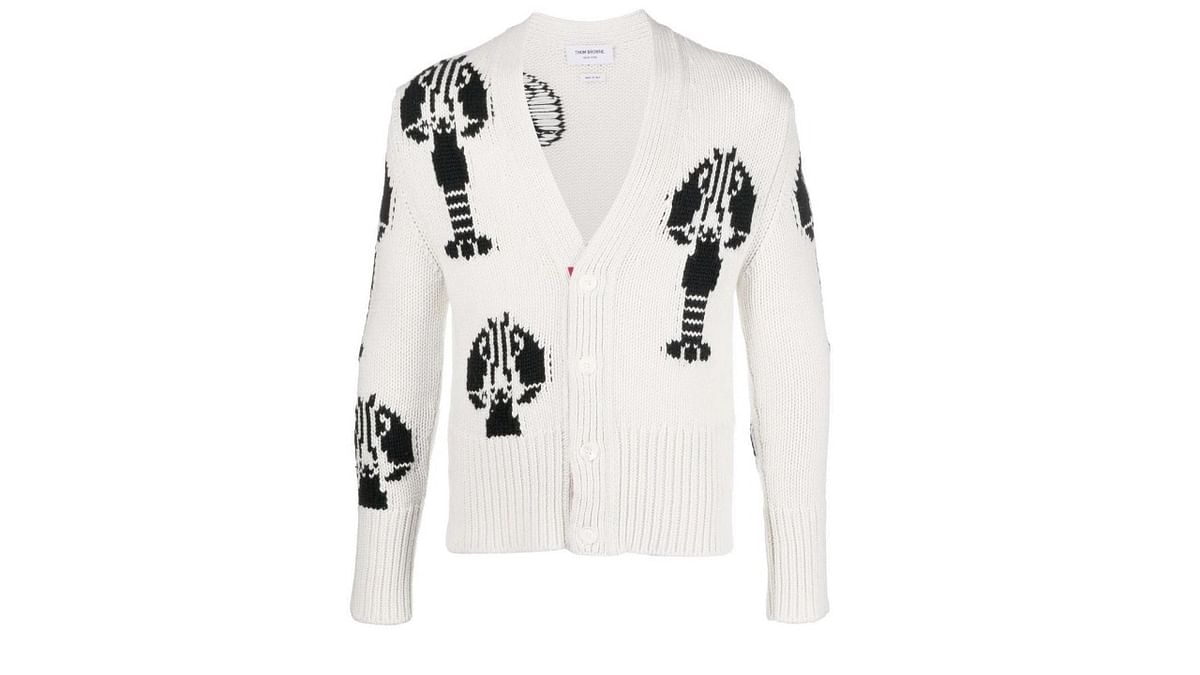 Lobster knit: Here’s a lobster cashmere cardigan in intarsia knit from Thom Browne. It comes in a monochromatic colour palette, with a V-neck and ribbed trim.