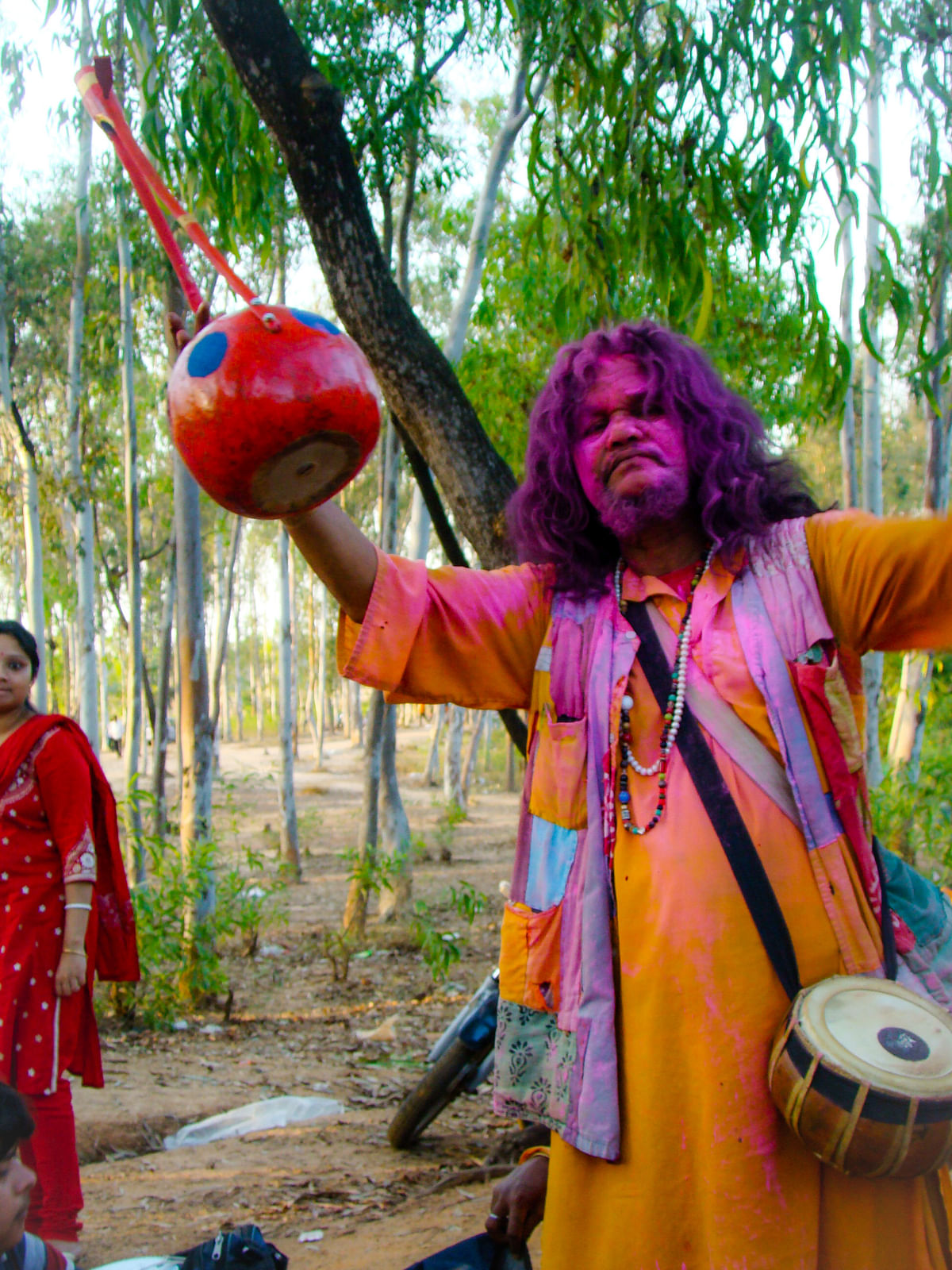 The saffron-clad Bauls—the mystical fakirs of Bengal keep the spirit alive as they sing thought-provoking songs on their “ektara”. Photo credit: Ayandrali Dutta