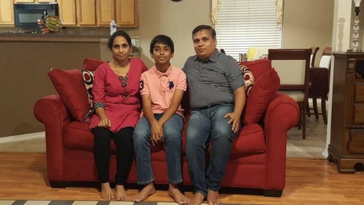The Hegde family sits in their living room in San Antonio, Texas. (From left) Madha Hegde, Satvik Hegde and Prabhakar Hegde.