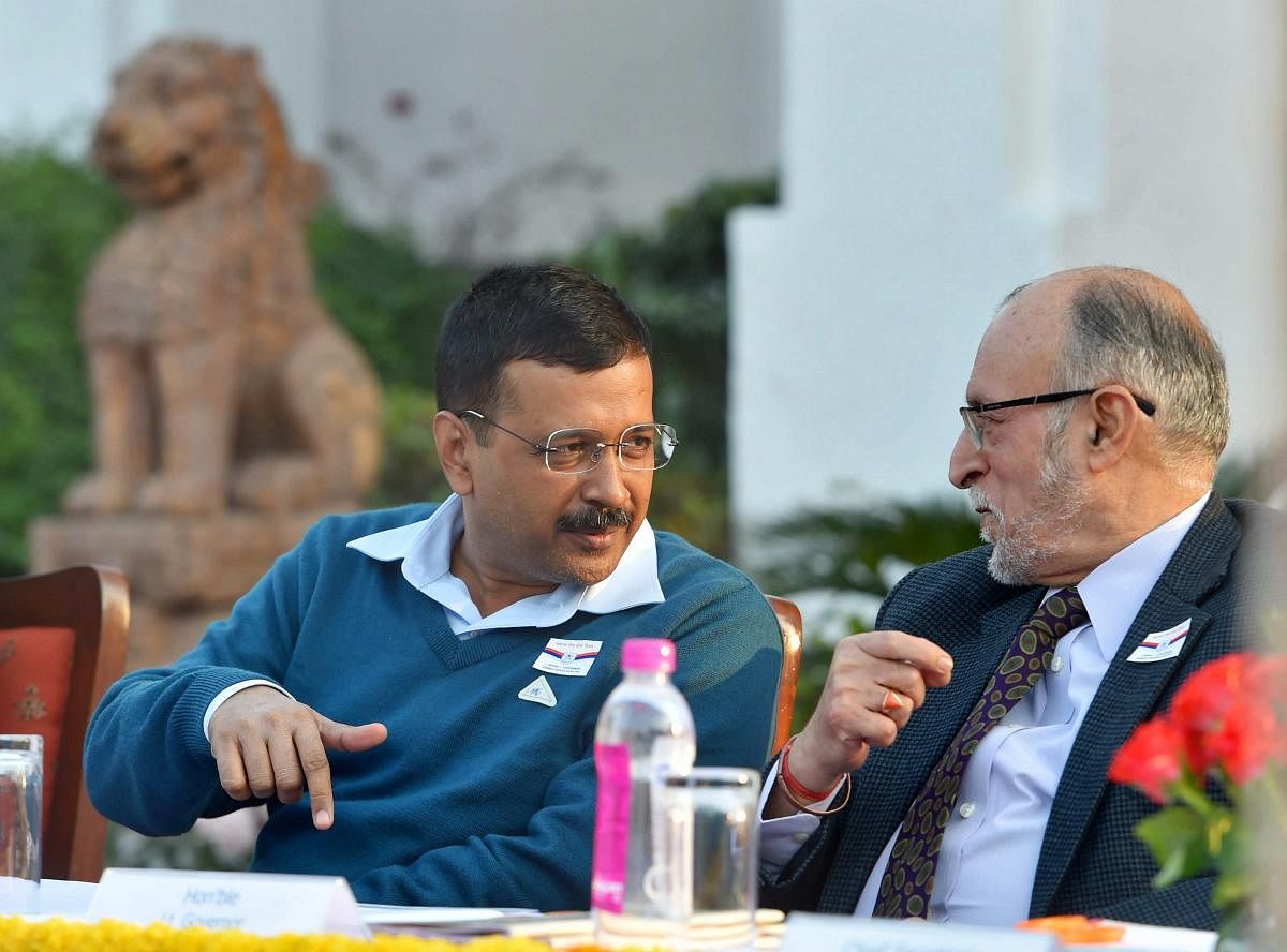 New Delhi: Delhi Lt Governor Anil Baijal with Chief Minister Arvind Kejriwal during the felicitation of ‘Gallantry Awardees’ and ‘Distinguished Service Medal Winners’ at a function at Raj Niwas in New Delhi on Thursday. Credit: PTI Photo