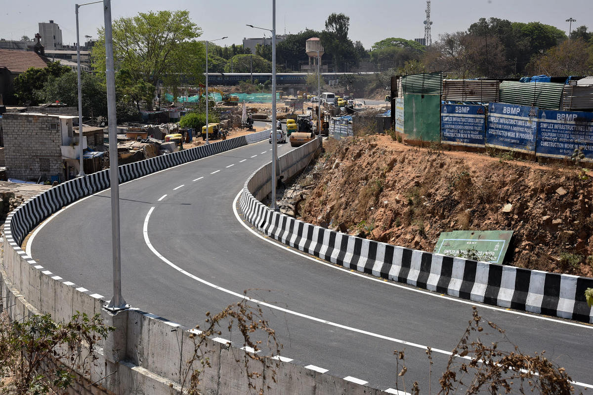 A view of one of the ramp's of the eight-lane flyover near the back entrance to the KSR Railway Station near Okalipuram. DH Photo/S K Dinesh