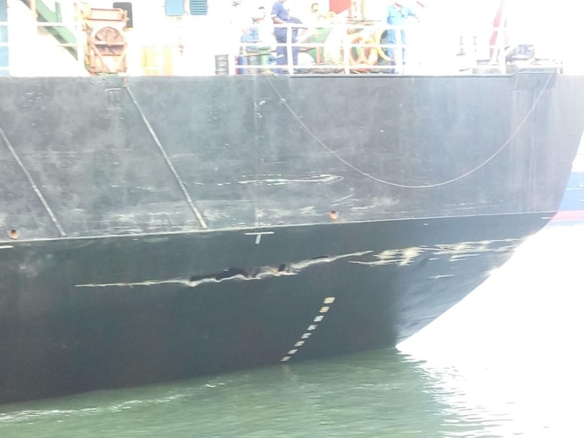 caption: Container ship, MV X- press Brahmaputra, sustained damage to port side hull while attempting to cast off from berth number 2 in New Mangalore Port on Saturday.