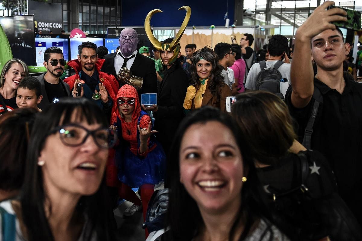 Gaming, comic and movie fans take photos during Comic Con Colombia.