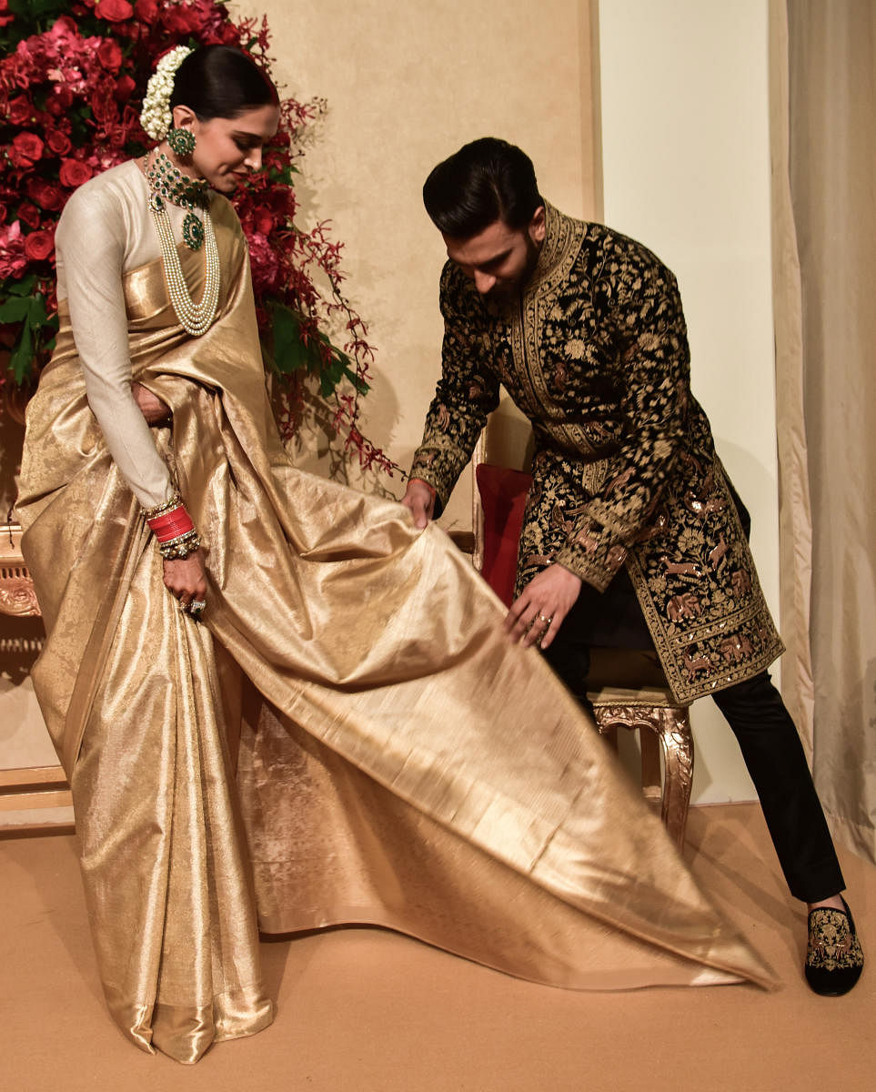 Deepika and Ranveer at the reception at The Leela Palace Bengaluru on Wednesday. DH PHOTOs BY SK Dinesh
