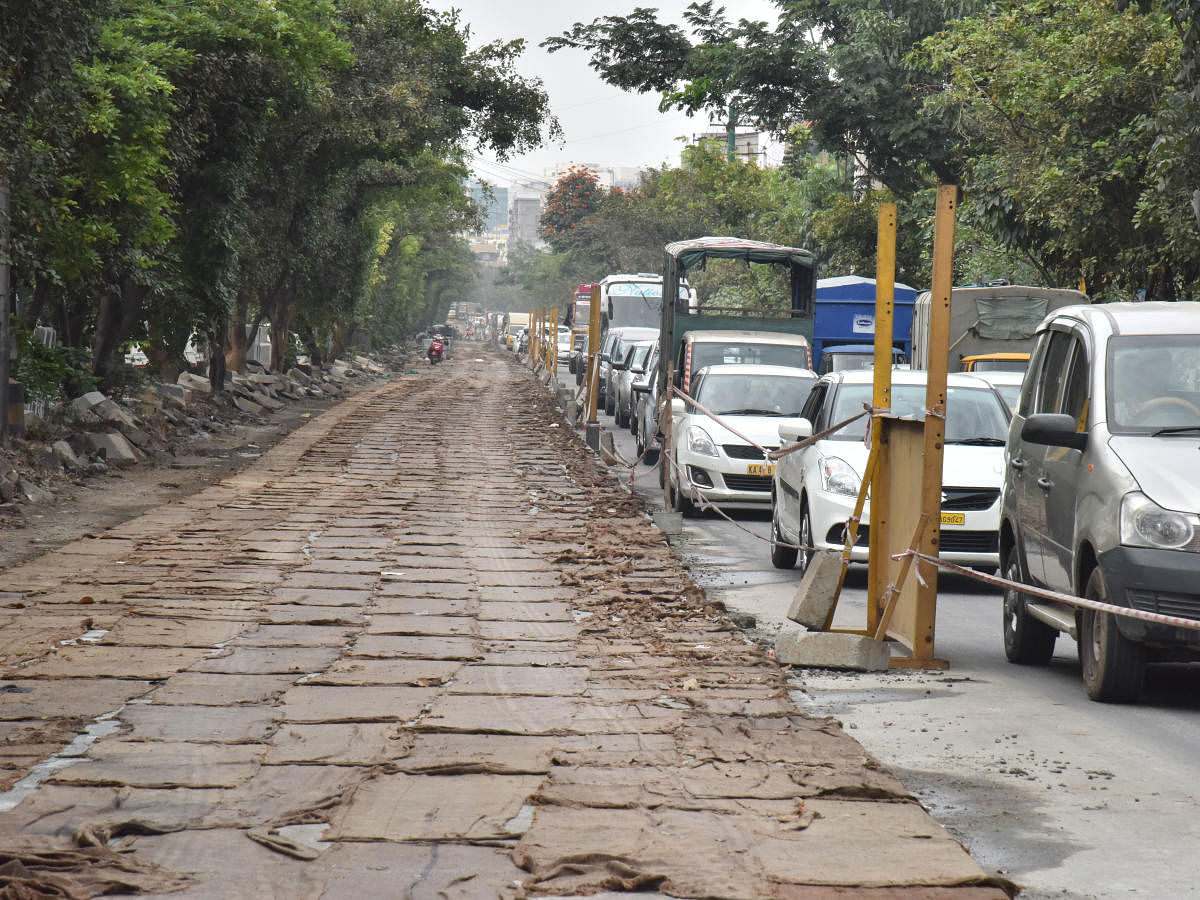 The BBMP spent Rs 15 crore to white-top every kilometre of the six-lane Outer Ring Road. The airport metro line is set to undo all the work. DH FILE PHOTO