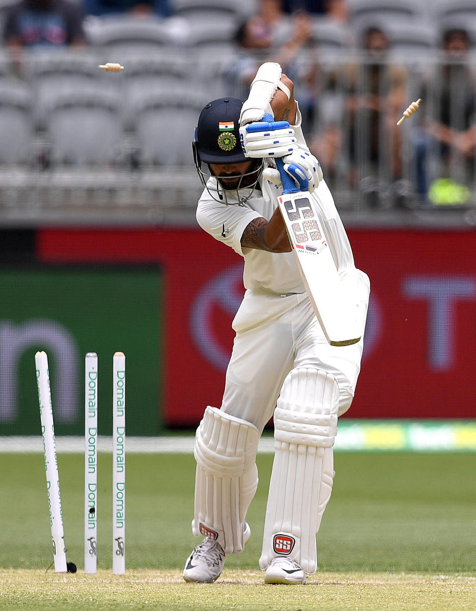 timber talk: M Vijay (left) and K L Rahul have failed to provide the starts that India desperately need in Australia. afp