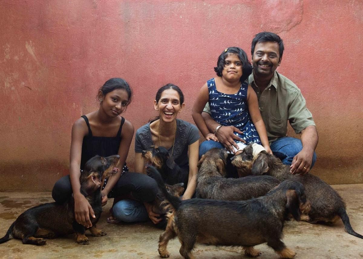 Preeti, Tapasya, Arya, Raj and their many dogs.