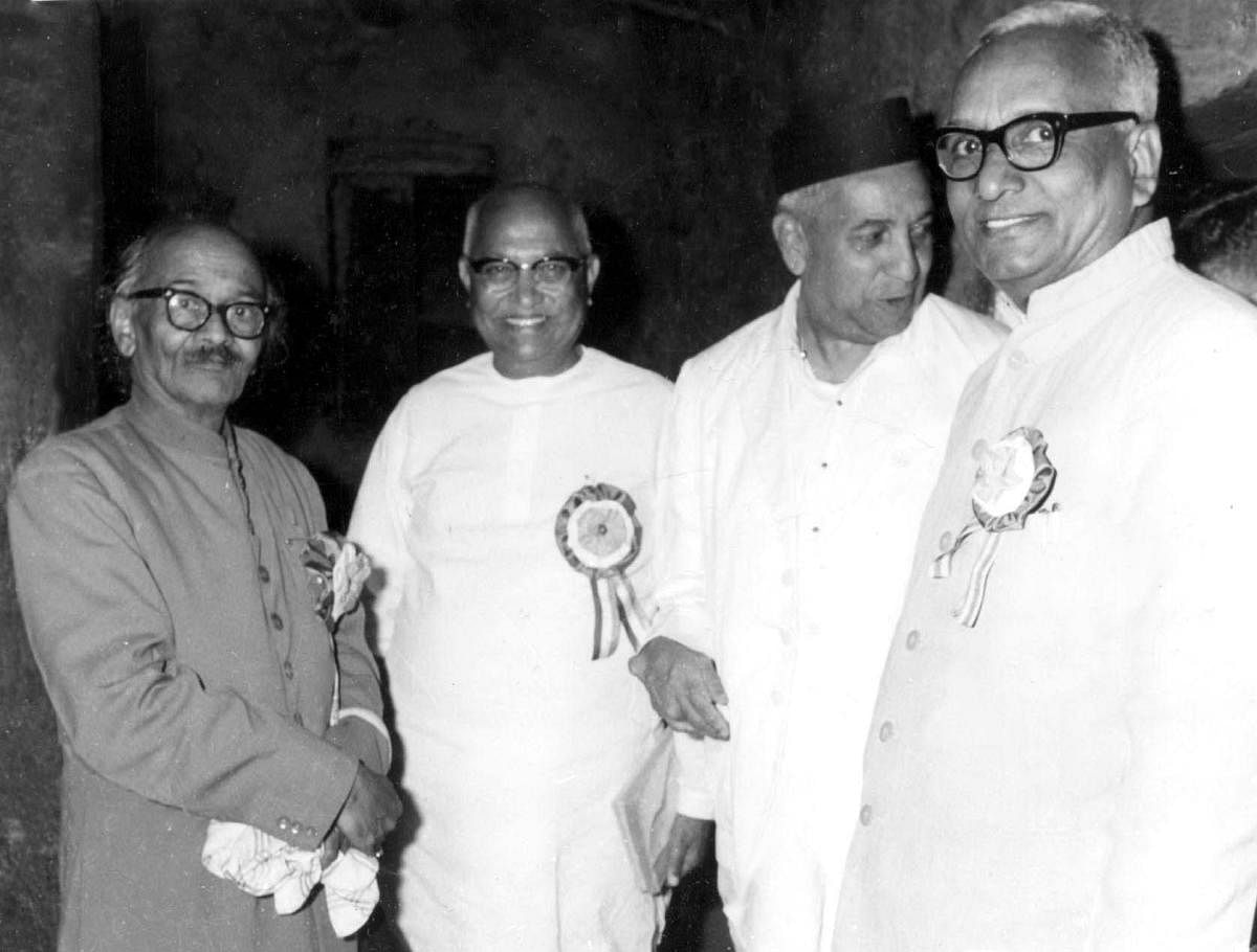 This Photograph was taken after foundation stone for Bendre Bhavan was laid at Shirahatti the birth place of poet D R Bendre_ Chief Minister Nijalingappa and Justice T K Tukol _fourth from left _ were with poet_Feb 1966 Photo by DH/PV Staff PhotographerK