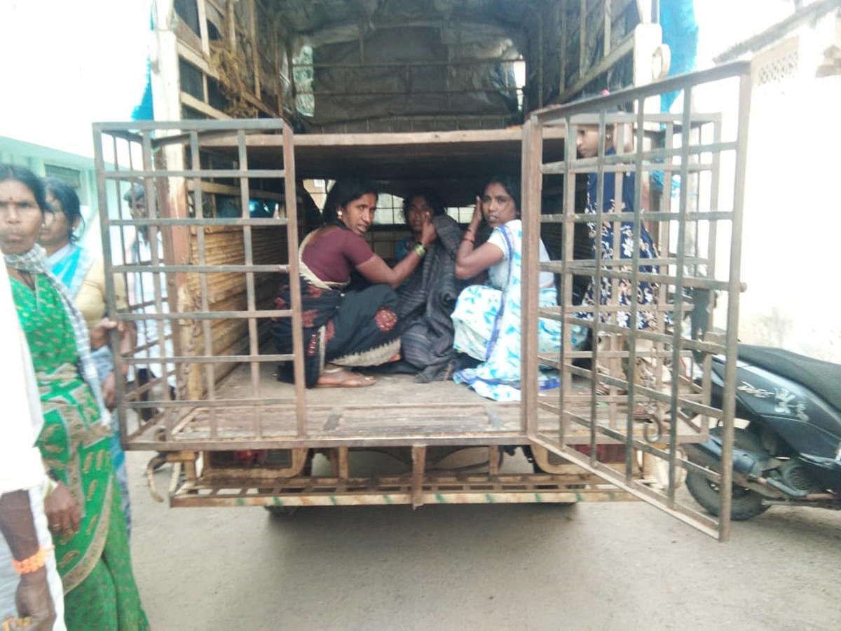In the absence of an ambulance, a pregnant woman being taken in asheep transporting tempo to Chitradurga District Hospital on Friday. DH Photo