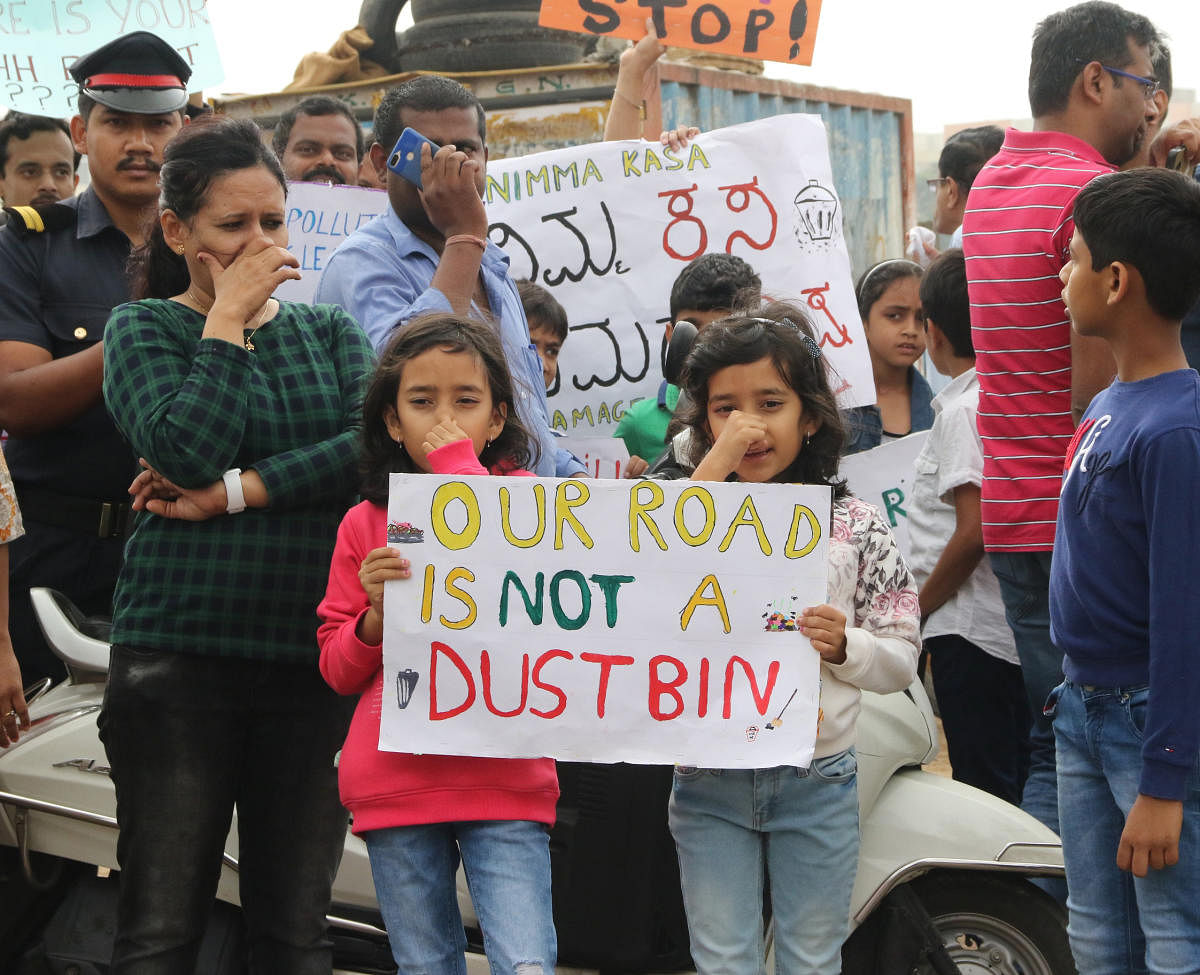 Residents of Ranka Colony, Bannerghatta Road, protest against the illegal dumping of garbage on Saturday.