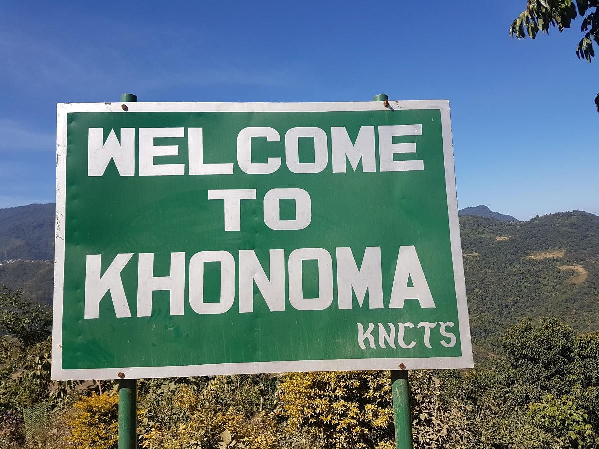 Signboard welcoming visitors to the enchanting Khonoma village.