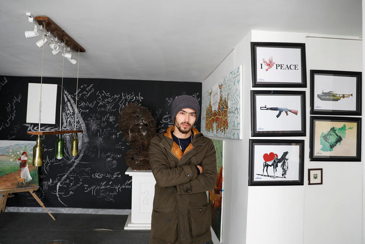 Afghan artist Mahdi Zahak, 25, poses for a picture at the ArtLords in Kabul, Afghanistan, January 26, 2019. (REUTERS)