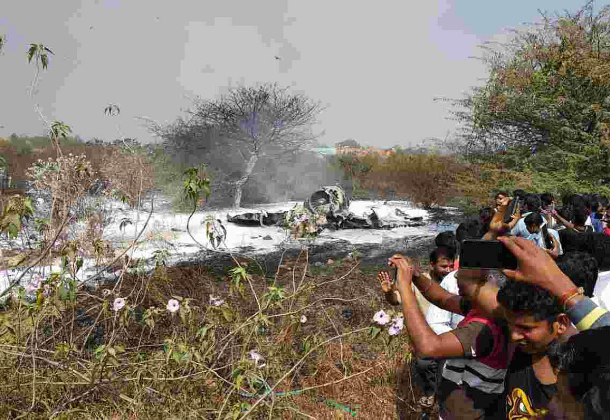 The wreckage of the Mirage 2000 fighter aircraft on HAL Airport runway soon after take-off in Bengaluru on Friday.