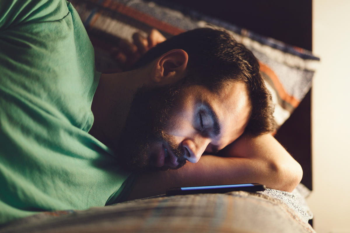 Medical experts suggest keeping electronic devices away while sleeping.