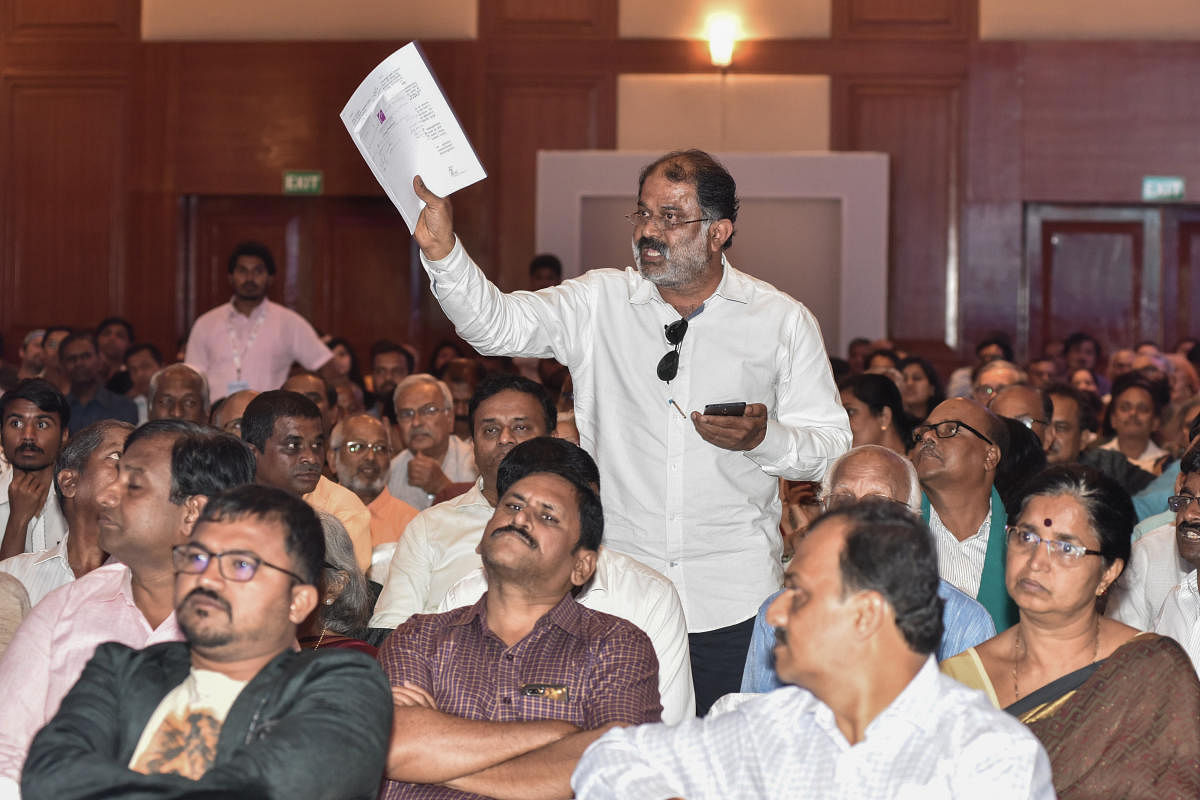 Babu Nagesh Rao, a resident, asks a question at the event. 