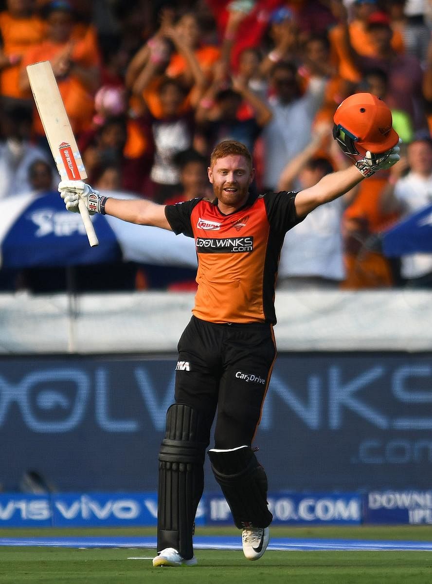 SRH batsman Jonny Bairstow celebrates after reaching his century against Royal Challengers Bangalore in Hyderabad on Sunday. AFP