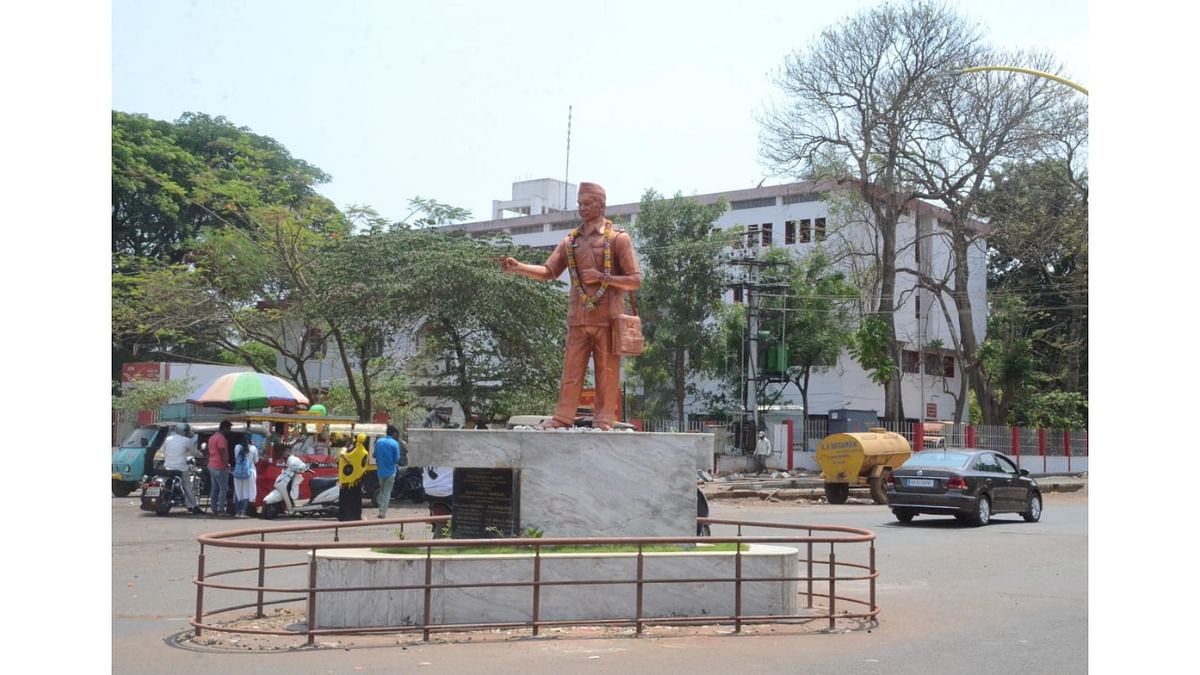 The statue of a postman erected at Postman Circle in Belagavi. Credit: DH Photo