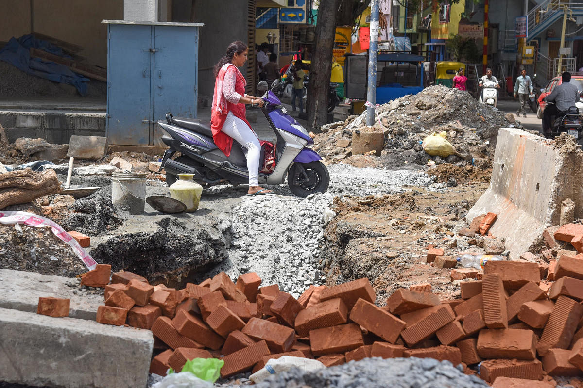 White-topping work at BTS Road, Wilson Garden, has affected traffic in the area on Saturday. DH Photo/S K Dinesh