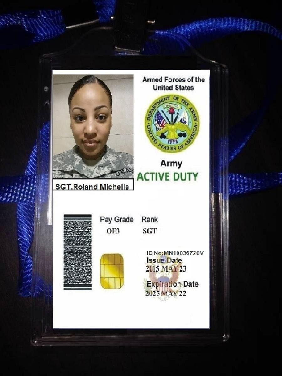 A photo of the ID card states that Roland Michelle is attached to the US army