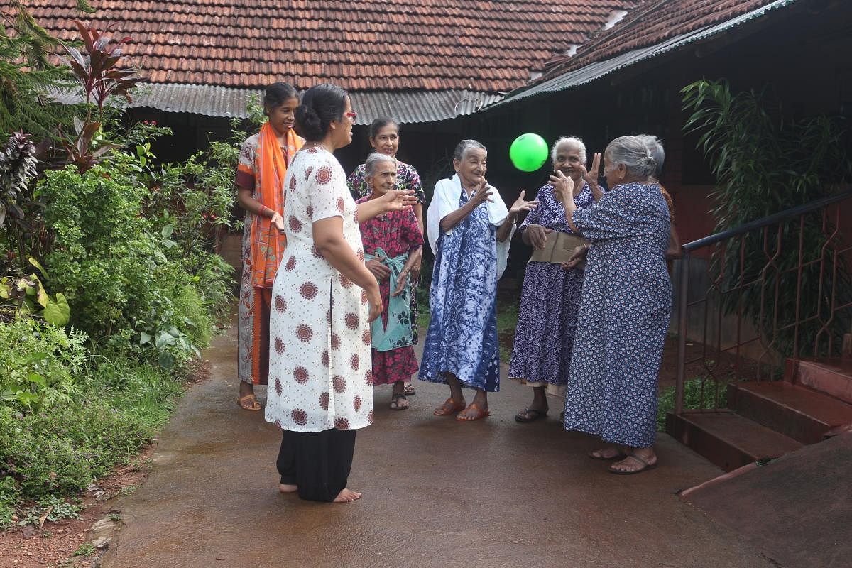 Residents of Mount Rosary Home in Moodbidri engaged in indoor and outdoor activities.