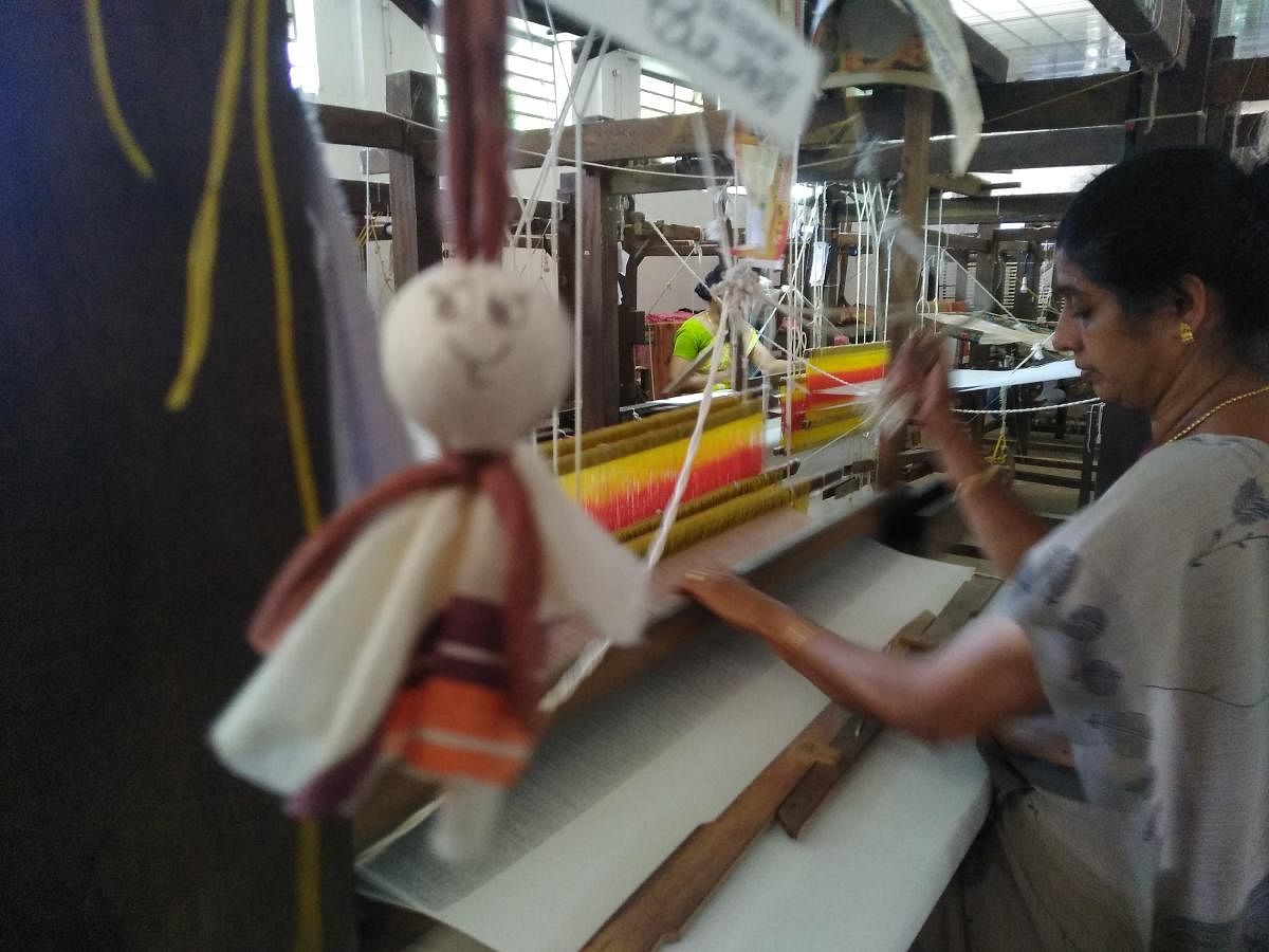 Chendamangalam handloom unit has been using the materials damaged by floods to make dolls; Aranmula metal mirror making unit sprand back to life thanks to the popular support it received from across the state. dh photos/ar