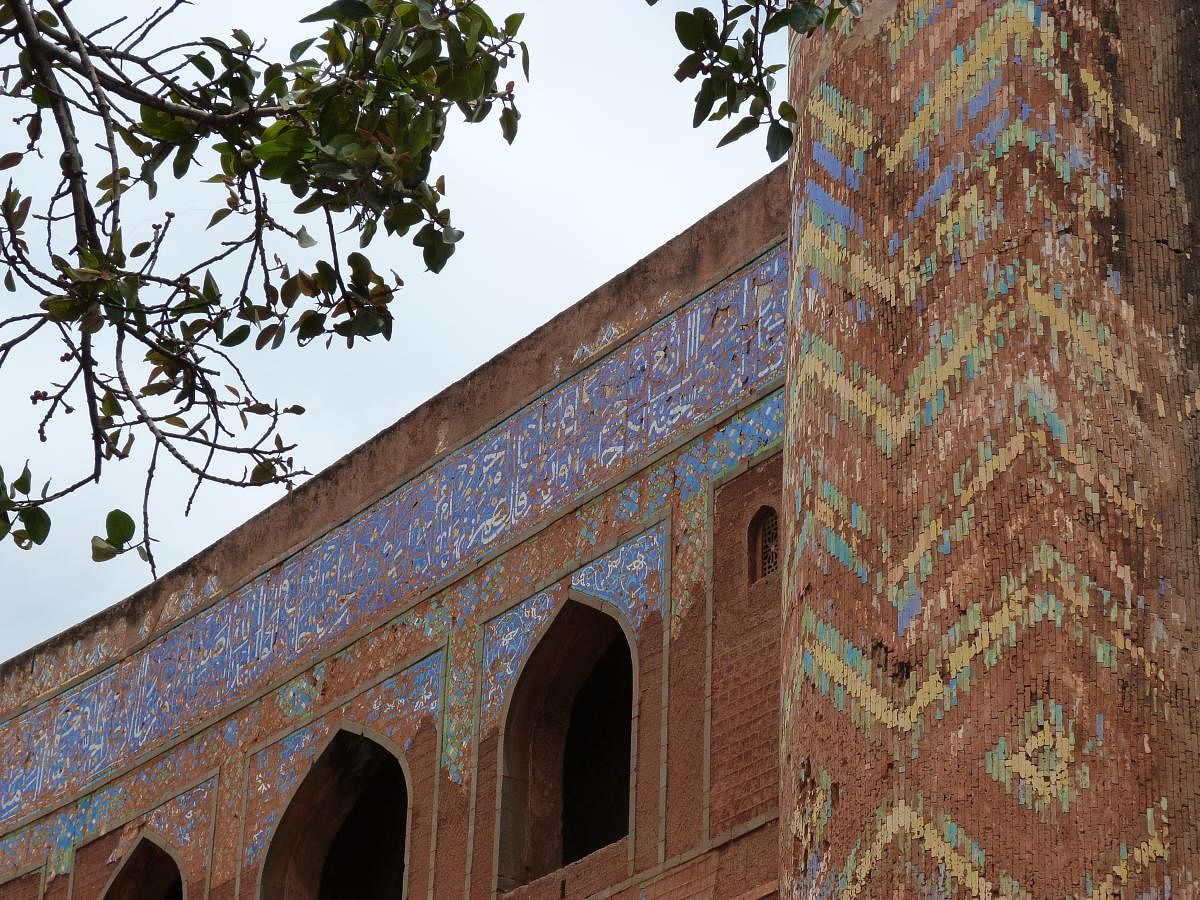 Imposing Persian-style tilework on the Mahmud Gawan madrasa in Bidar.