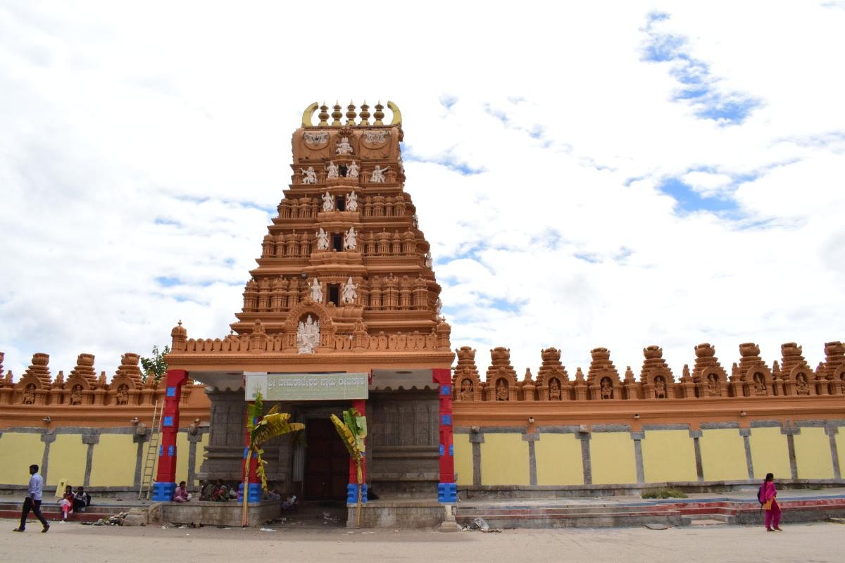 The temple’s gopura with five kalashas.