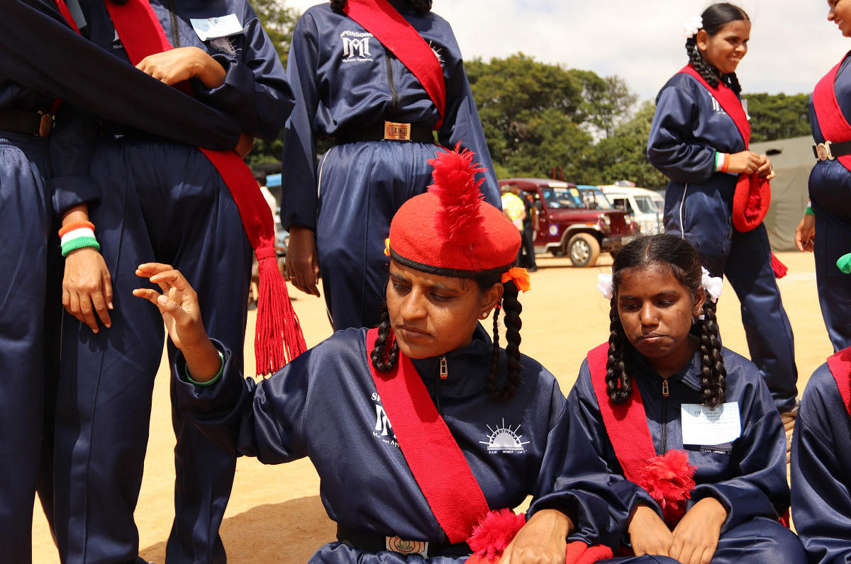 Blind and other disabled college-aged girls from the Samarathanam Trust during the Independence Day parade in Bengaluru on August 15, 2019.