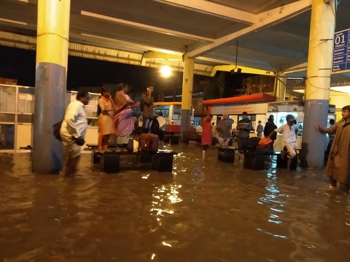 Heavy showers flood KSRTC bus stand in Davangere on Sunday.
