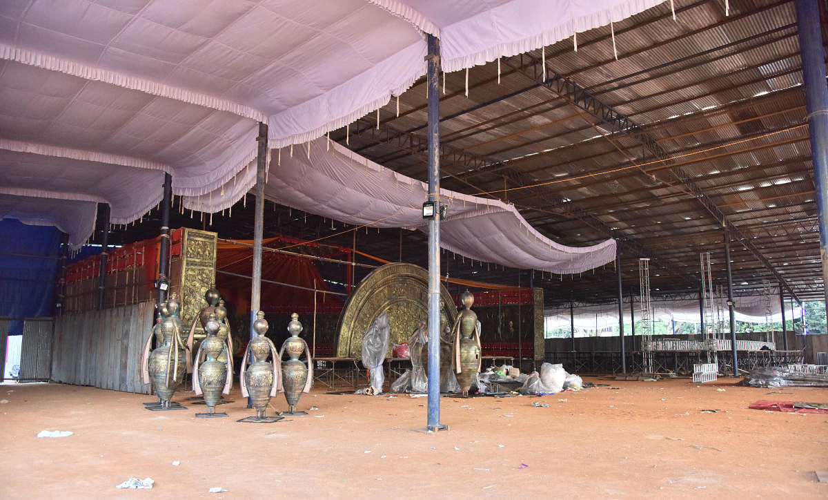 Preparations in full swing at the pandal for the Ganesha festival at the college ground on Thursday.DH PhotoS/vijayasimha v & Janardhan B K