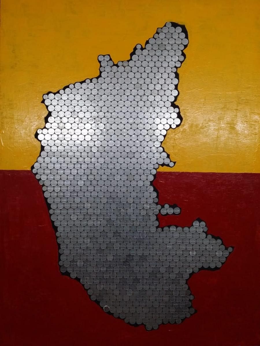 Karnataka map studded with 25 paise coins.