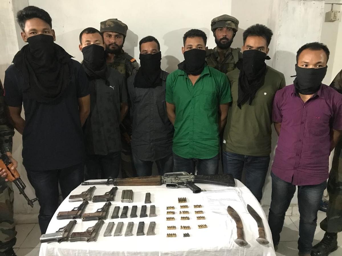 The arrested people with weapons in Kokrajhar in Assam, on Tuesday. Photo credit: army