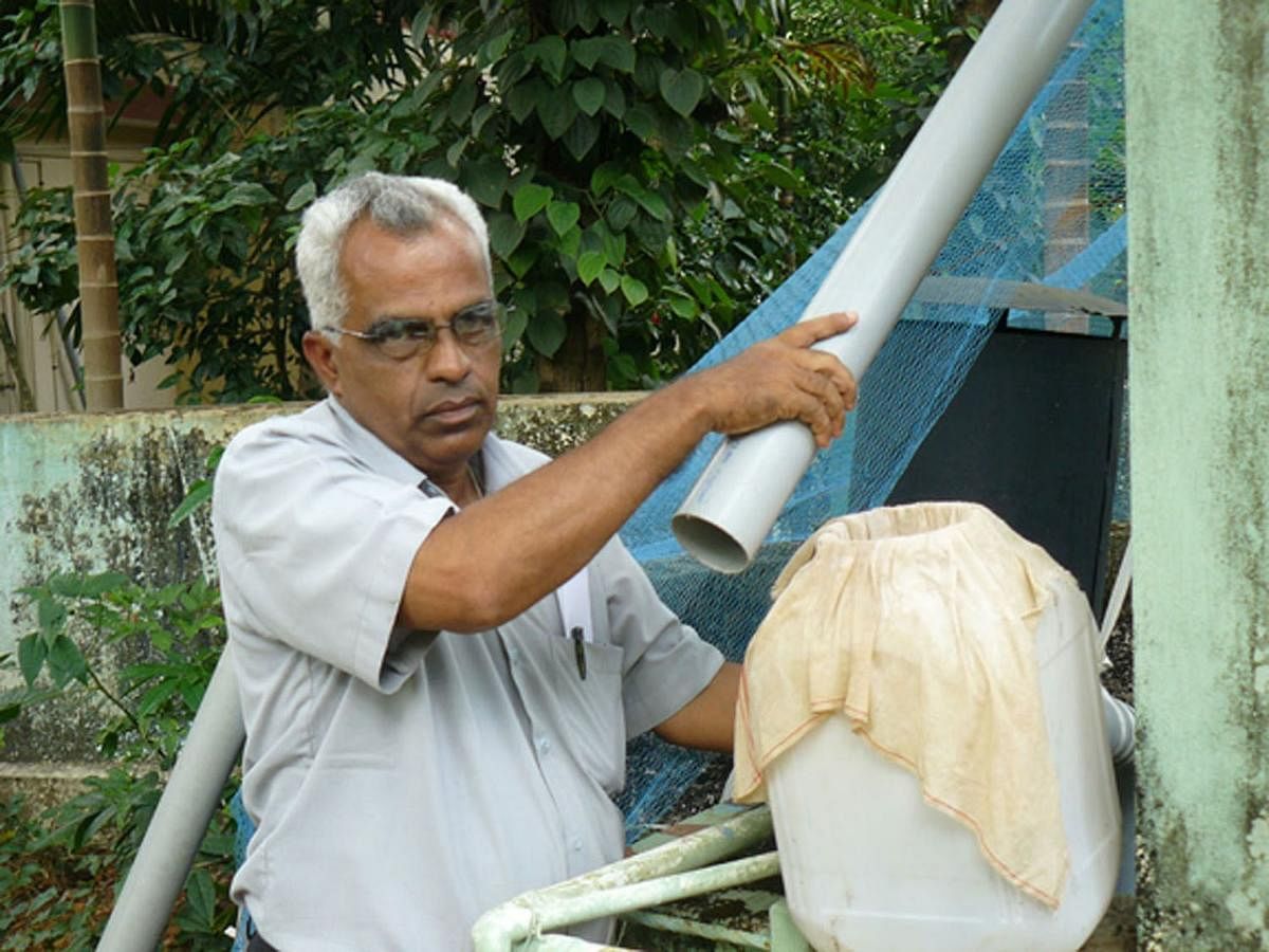A resident in Udupi purifying rainwater collected from his terrace 