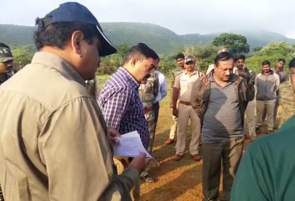 PCCF (Wildlife) Sanjay Mohan interacts with the officials during the combing operation to trap the tiger, at Gundlupet taluk, Chamarajanagar district.