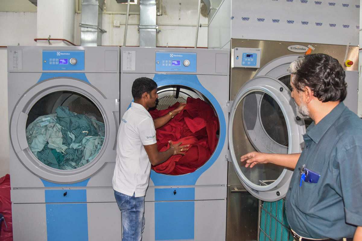 Automated Barrier Laundry System is setup at Emergency and Trauma Care Centre, at Victoria Hospital Campus in Bengaluru on Thursday. Photo by S K Dinesh