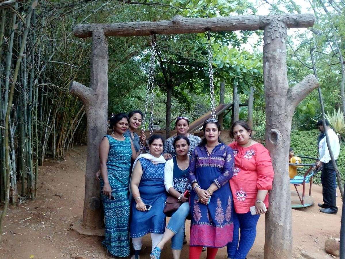 Yogitha Jagadeesh (in red) with her friends at Guhanthara Resort, Kanakpura Road. She believes that trips with other mothers give one a fresh outlook towards things.
