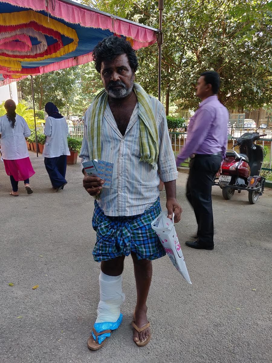 Mahadeva came all the way from Malavalli to get medicines for his swollen leg. DH PHOTO/RESHMA RAVISHANKER