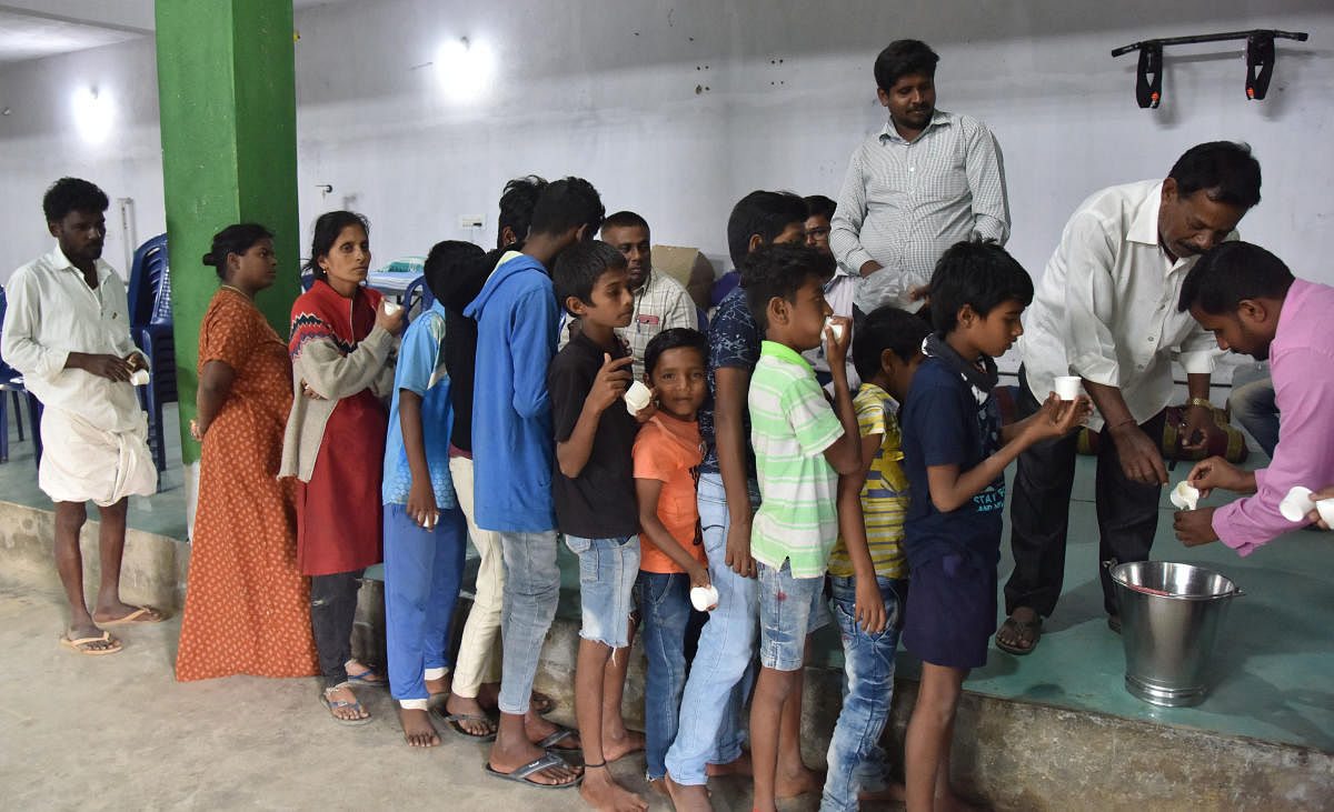 Young boys at a BBMP relief centre in Hulimavu on Tuesday. DH PHOTO/Janardhan B K