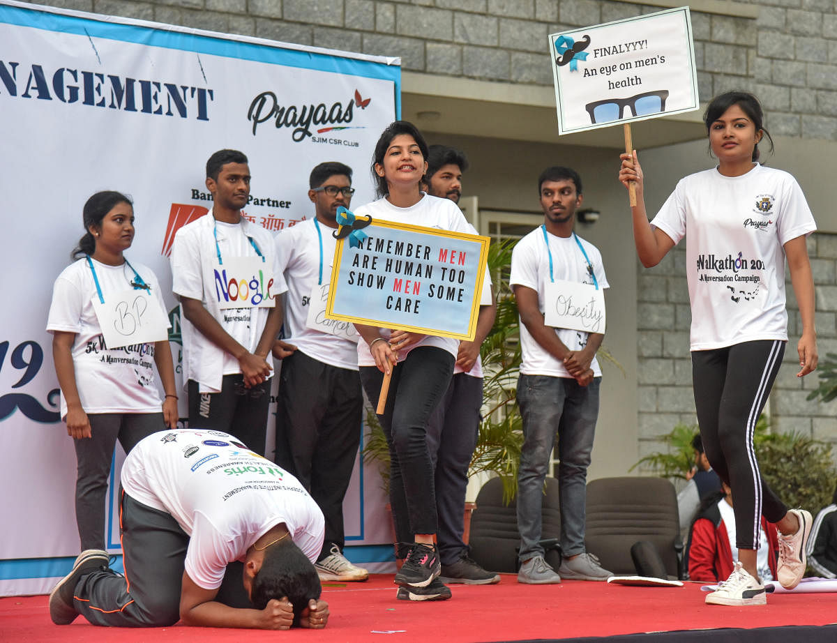 Fortis Hospital staff perform a skit on men's health as part of the 5K walkathon on Sunday. DH PHOTO/S K DINESH