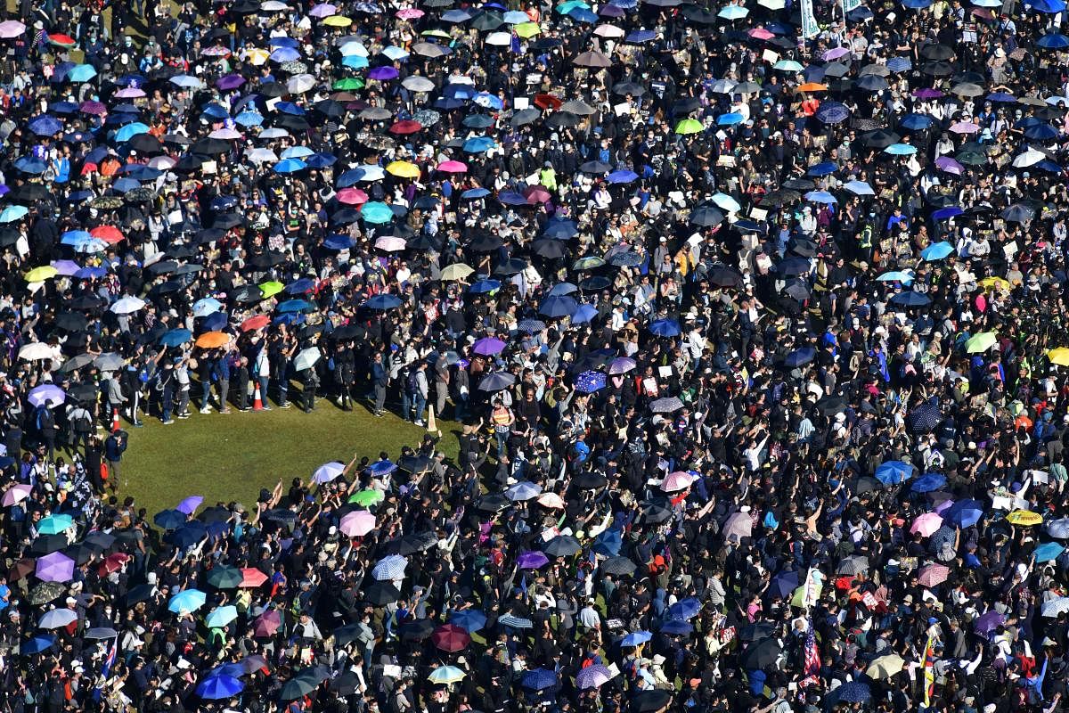 People gather at Victoria Park for a pro-democracy rally in Hong Kong on December 8, 2019 (Photo by AFP)