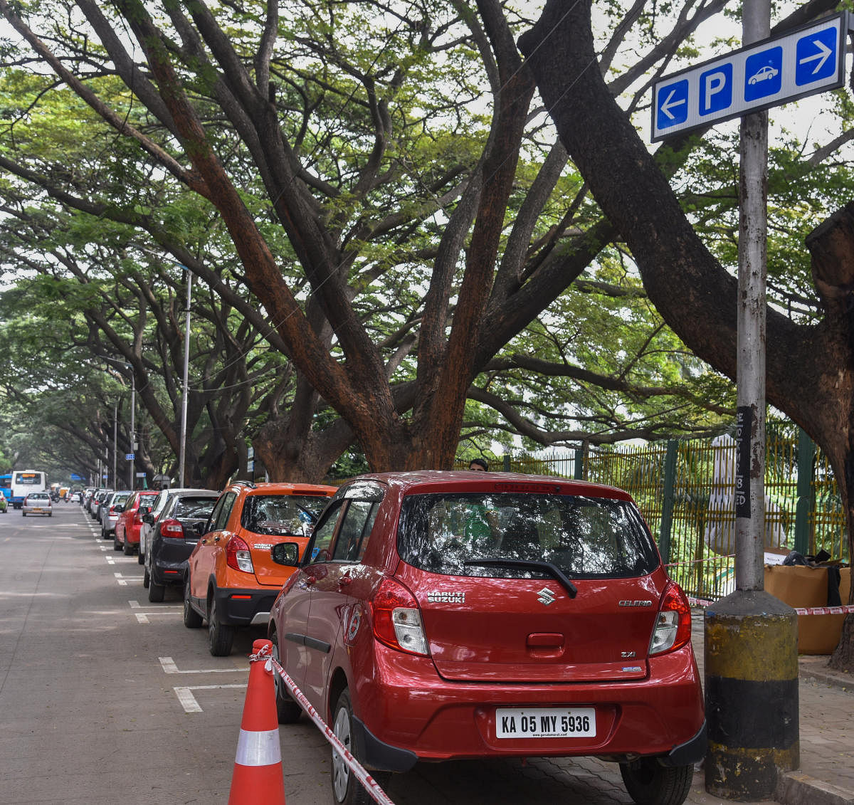 Smart Car Parking trail work is going on by BBMP maintain by Central Parking Services at Kasturba Road in Bengaluru on Saturday. (Photo by S K Dinesh)