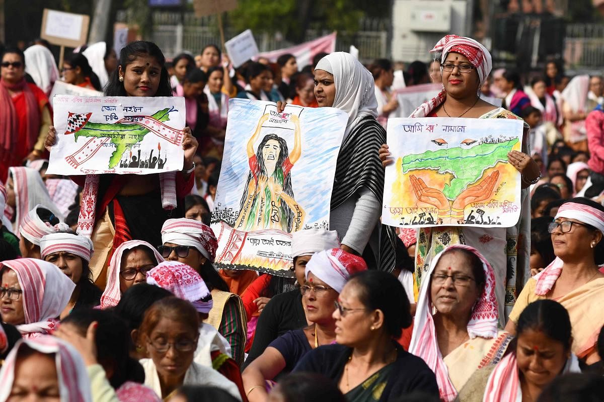 Thousands of people joined fresh rallies against a contentious citizenship law in India on December 21, with 20 killed so far in the unrest. (Photo by AFP)