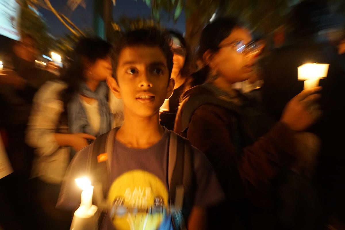 12-year-old Pranav, at the candlelight vigil in Bengaluru on Dec 24, 2019. The seventh-grade student said that he decided to protest against the CAA after reading out the act in a newspaper during a school excursion in Maharashtra.
