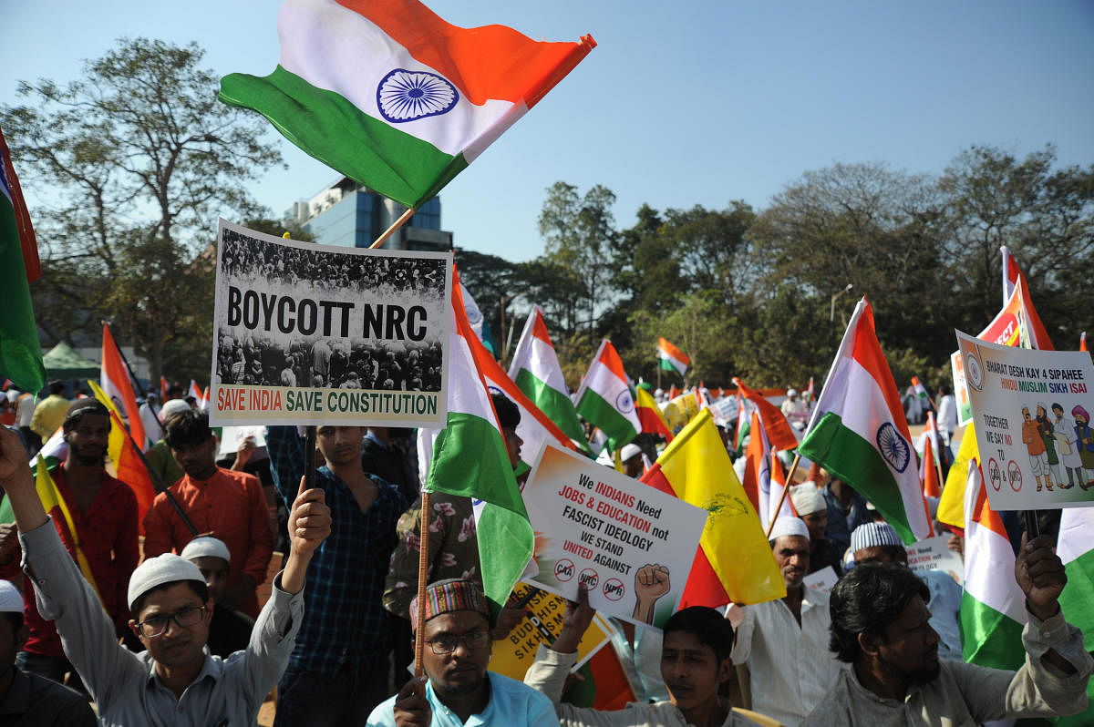 People protest against the CAA at Freedom Park in Bengaluru on Friday. DH PHOTO/Pushkar V
