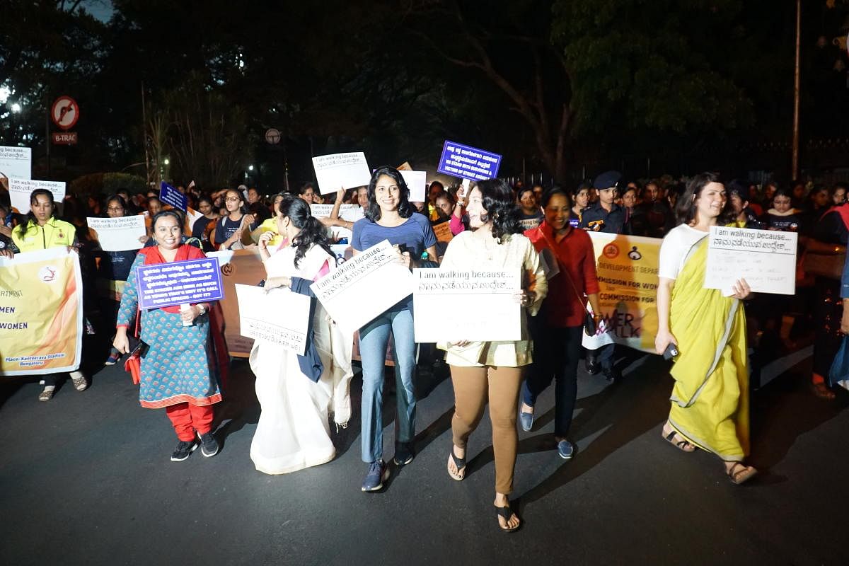 A group of women participate in Power 2020 on the night of March 1, 2020. In the front are several celebrities taking part in the walk.
