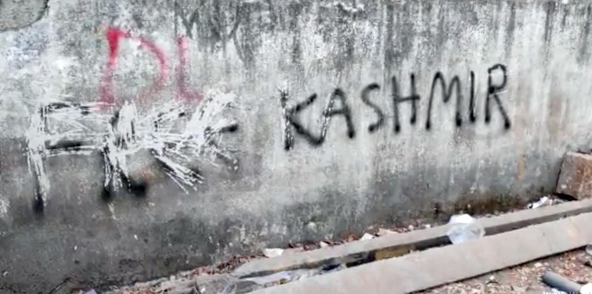 Graffiti for liberating Kashmir sprayed on a wall on Dickenson Road. 